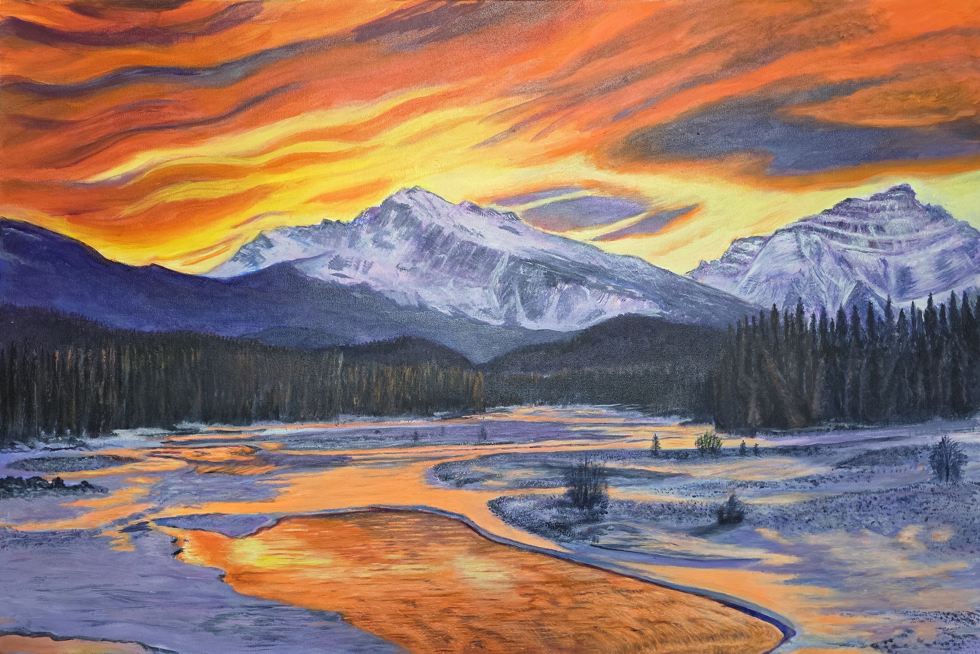 A stunning winter sunset landscape in the Canadian Rocky mountains.
